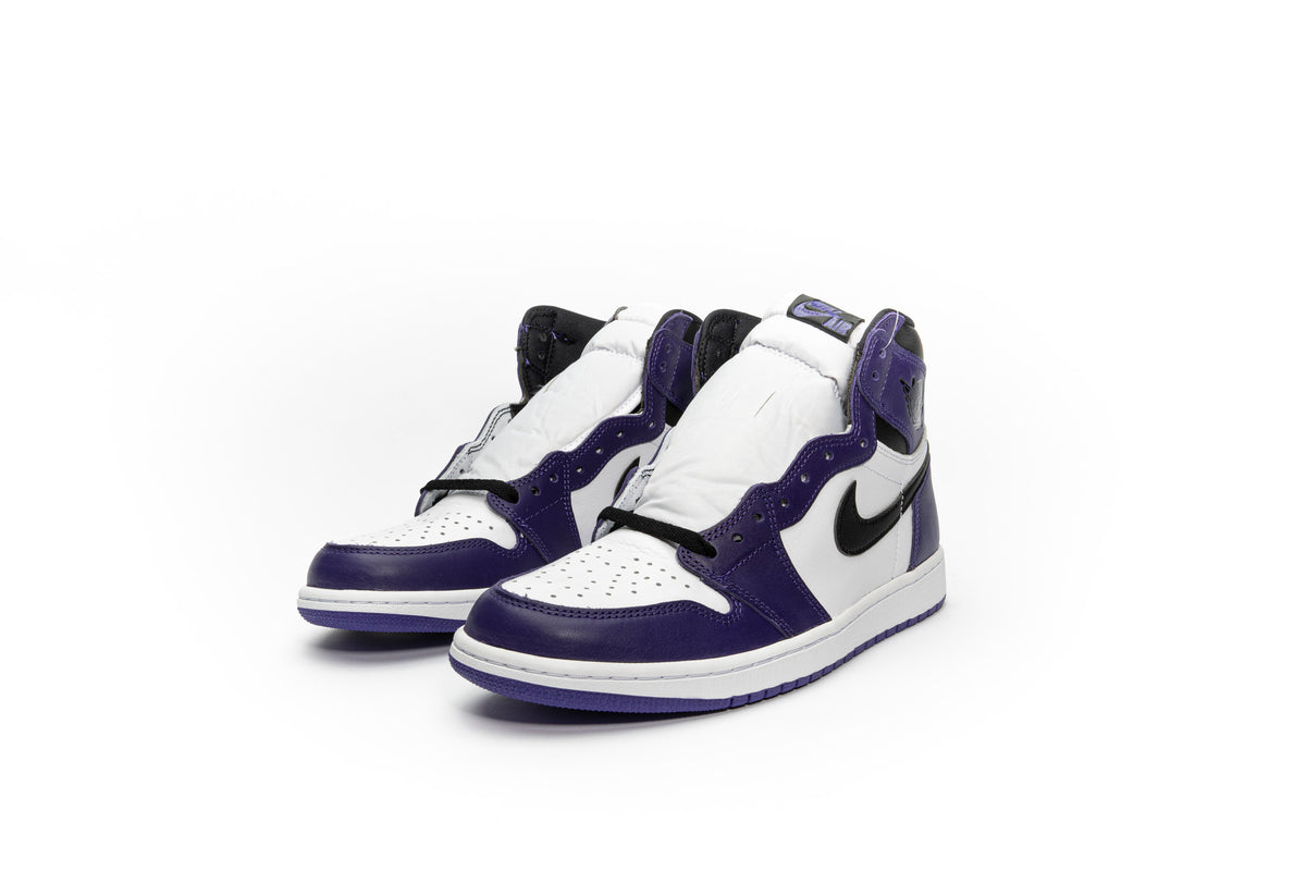 purple and white high top jordans